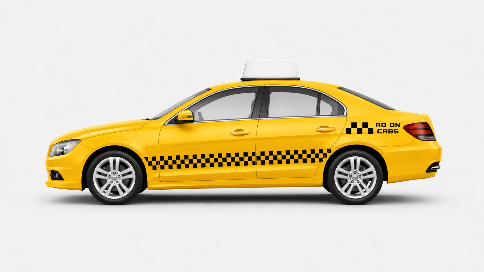 Side view of an Ad On Cabs yellow taxi